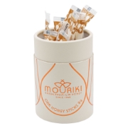 Close-up shot of Mouriki Oak Honey showing its dark color, rich texture, and caramel notes, emphasizing its natural antioxidant properties.